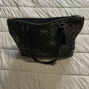Black and gray coach purse